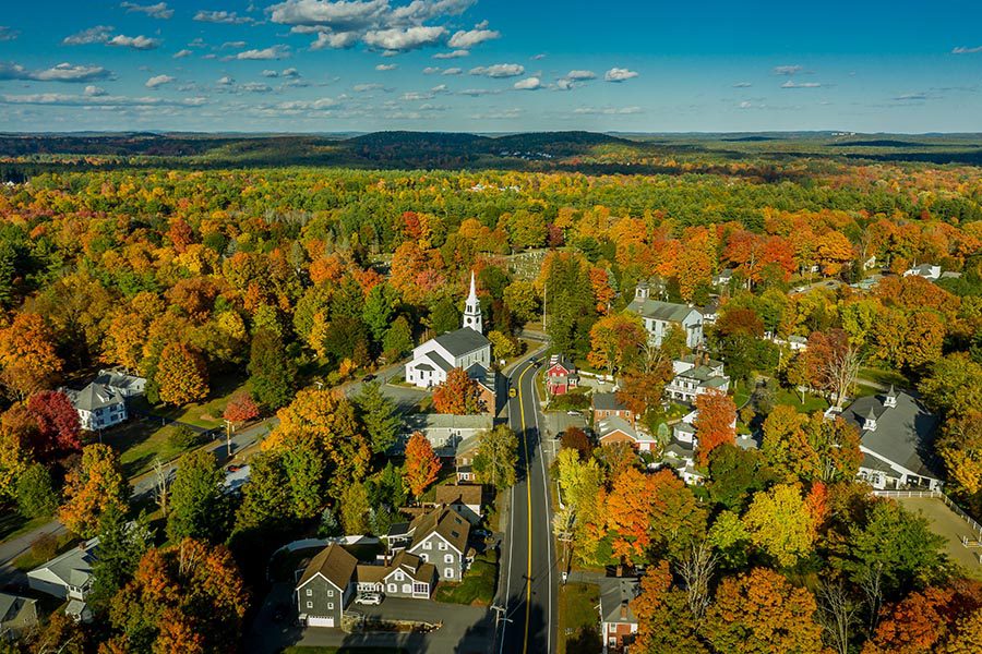 Whitman, MA Insurance - Birds Eye View of a New England Town in Autumn